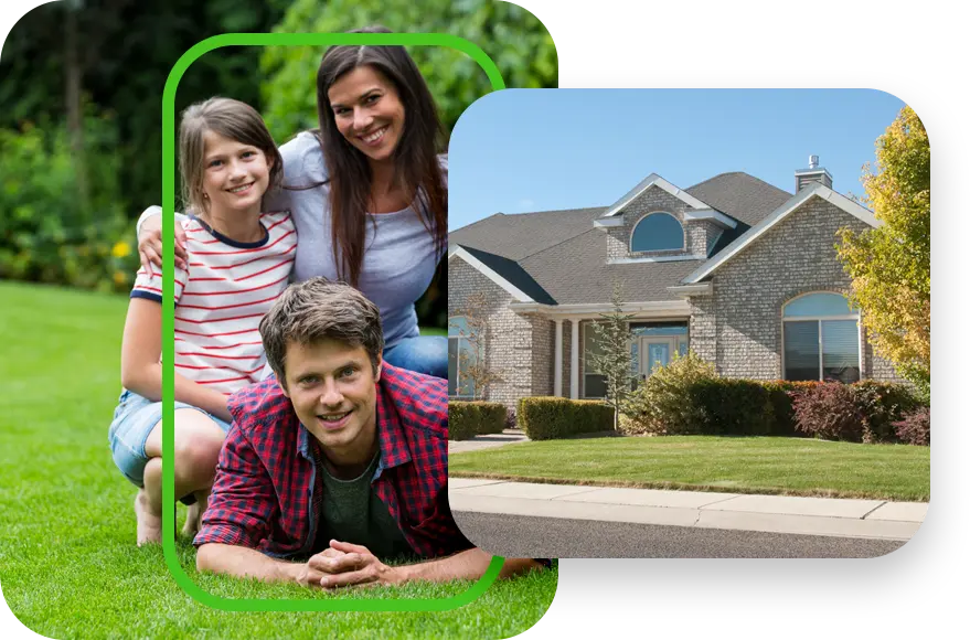 family laying in green grass